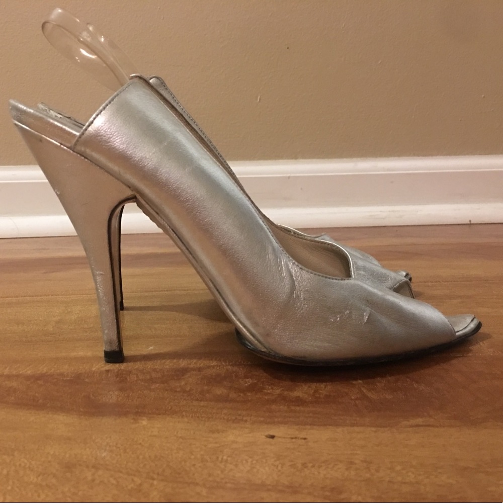Authentic Gucci vintage silver open toe heels.
